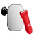 Red electric trimmer positioned in front of a wall-mounted mirror on a black background.