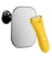 Yellow electric hair trimmer positioned next to a wall-mounted rectangular mirror with rounded edges.