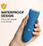 Waterproof blue electric hair trimmer with ergonomic design held in hand, covered in water droplets.