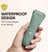 Hand holding waterproof green electric hair trimmer with water droplets, highlighting shower-safe grooming design.