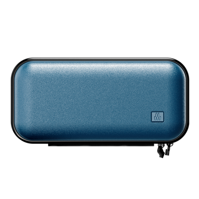 Blue textured rectangular travel case for grooming and skincare products with a zip closure.