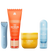 Set of men's grooming products including an electric trimmer, exfoliating scrub, ingrown hair eliminating pads, and daily soothing spray.