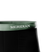 Close-up of black fabric with a green waistband featuring the "MERIDIAN" brand name in white letters.