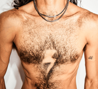 Man whose chest hair has been groomed to show a lightning sign