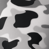 Black, white, and gray abstract camouflage pattern textile close-up with smooth fabric texture for fashion or outdoor gear