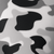 Black, white, and gray abstract camouflage pattern textile close-up with smooth fabric texture for fashion or outdoor gear