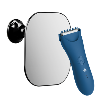 Blue electric hair trimmer positioned next to a rectangular wall-mounted mirror.
