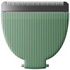 Close-up image of a green textured hair clipper blade attachment.