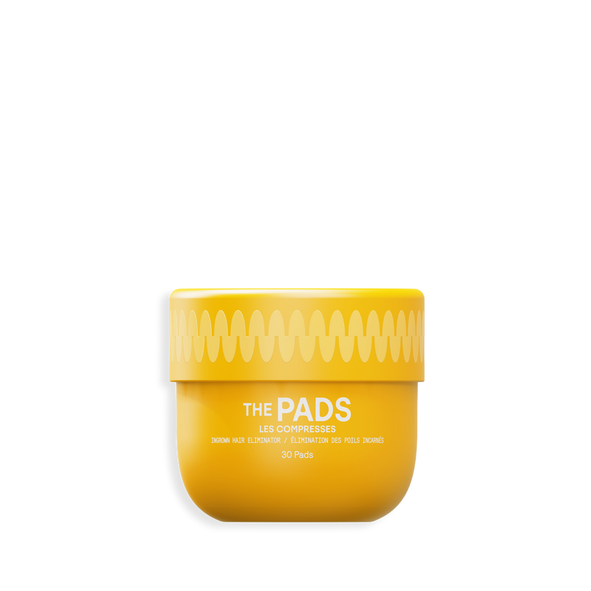 Yellow container of THE PADS gentle exfoliating pads for skin care with wavy design on the lid, isolated on white background