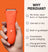 Ergonomic orange Meridian electric trimmer held in hand with features: no nicks, wet/dry use, built-in light, quick charge, one guard multi-length trim.