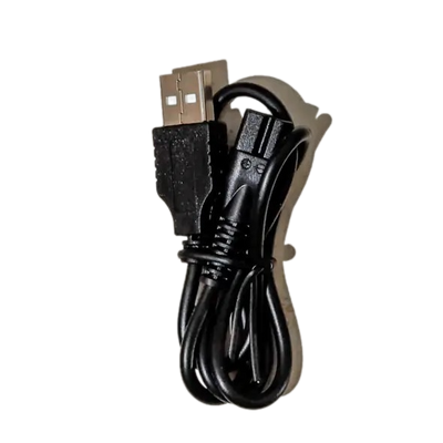 Black USB charging cable coiled against a black background.
