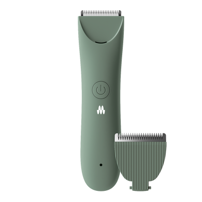 Electric men's hair trimmer in matte green with detachable blade attachment.
